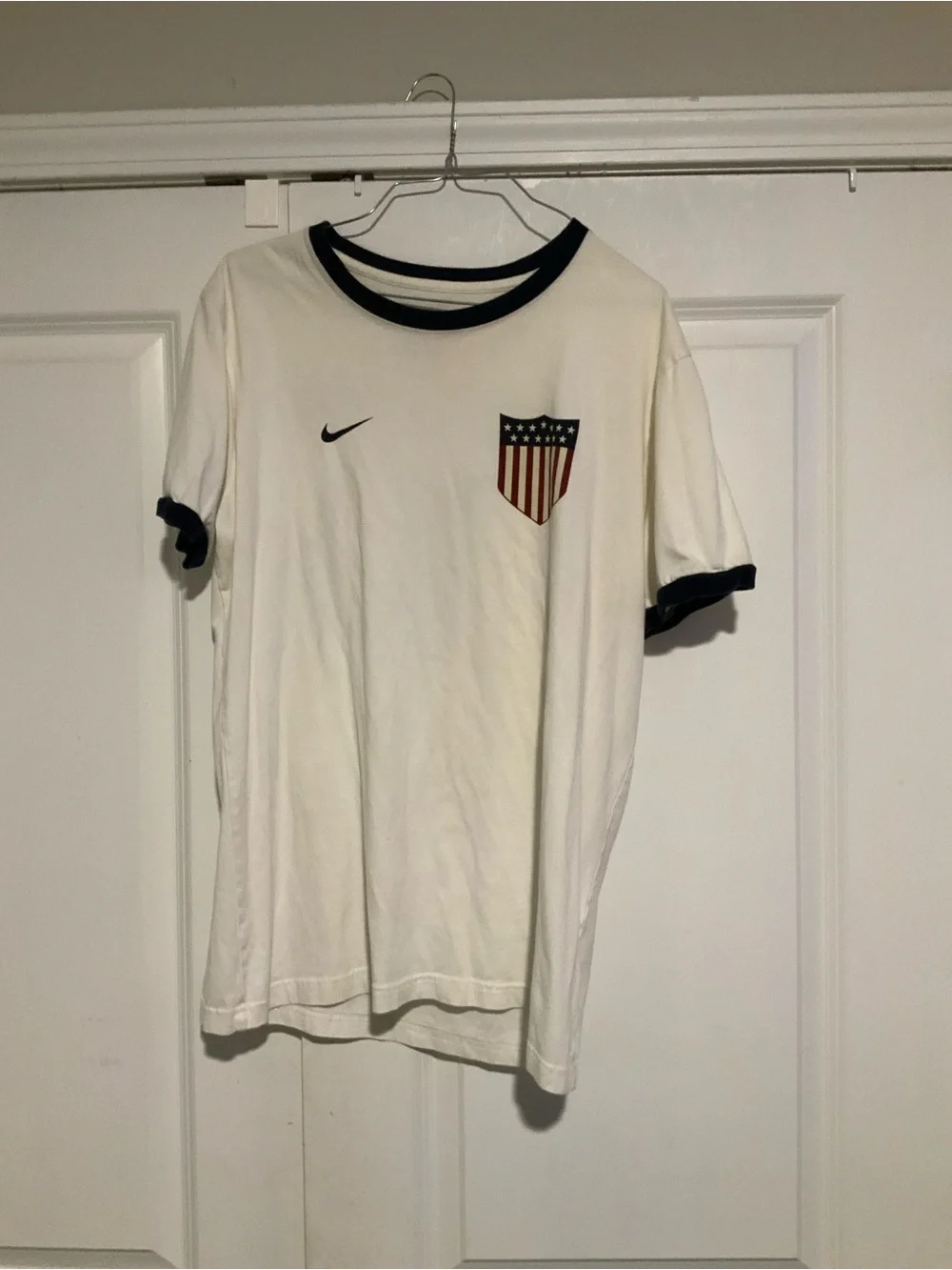 Nike White Short Sleeve Ringer Tee with Navy Trim and Shield Patch